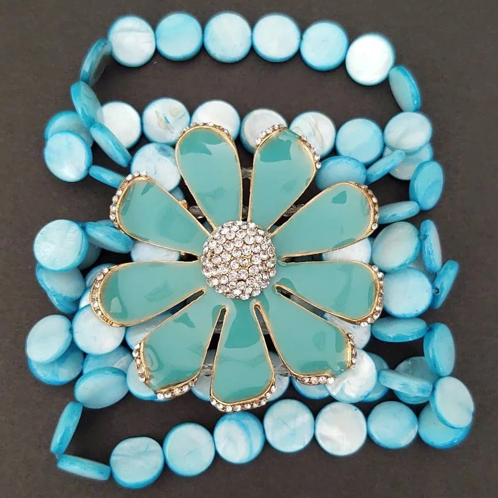 Dyed shell stretch bracelet w/enamel flower& cz's